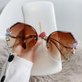 Woman Rimless Diamond Sunglasses