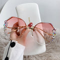 Woman Rimless Diamond Sunglasses